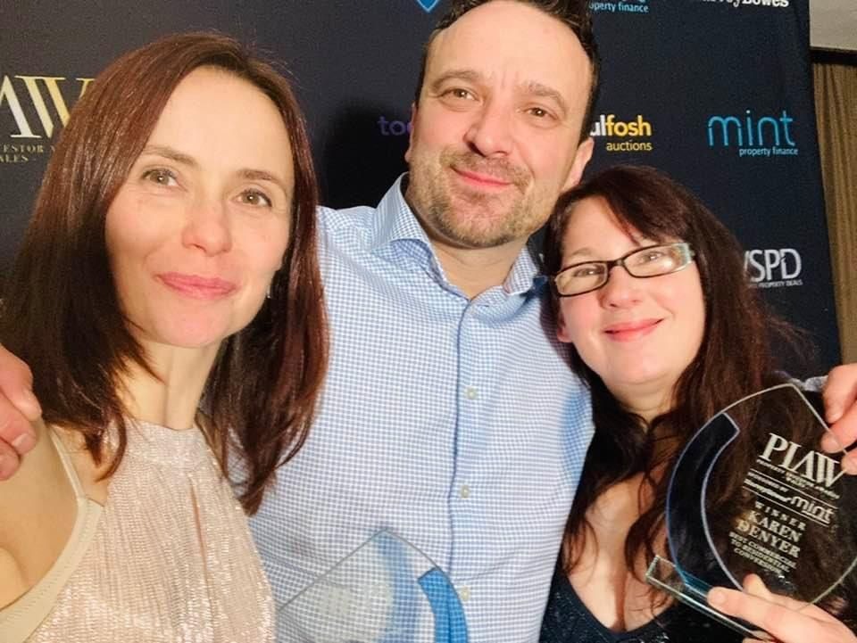 PIAW winner with trophy at awards ceremony